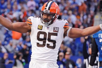 Cleveland Browns defensive end Myles Garrett (number 95) stands on the football field during a game