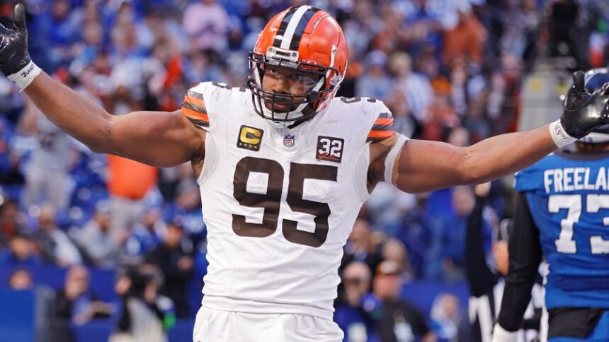 Cleveland Browns defensive end Myles Garrett (number 95) stands on the football field during a game
