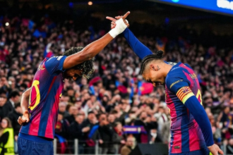 Lamine Yamal and Raphinha celebrating in Barcelona win over Newcastle