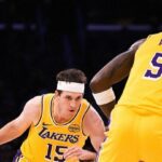 Austin Reaves and Ayton in a Pick n Roll, supporting LeBron in scoring