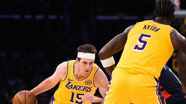 Austin Reaves and Ayton in a Pick n Roll, supporting LeBron in scoring