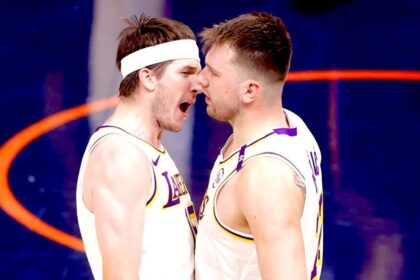 Austin Reeves and Luka Doncic screaming at each other, in Lakers win over New York Knicks