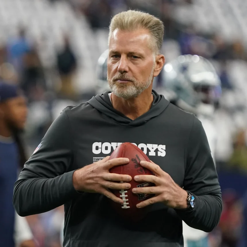 Dallas Cowboys defensive coordinator Matt Eberflus on the field during pregame at AT&T Stadium.