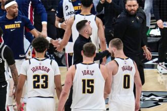 Cam Johnson, Nikola Jokic, and Christian Braun in Denver Nugget's win