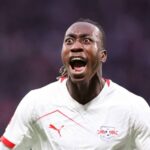Yan Diomande in the shirt of RB Leipzig