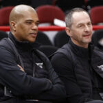 Chicago Bulls executive vice president of basketball operations Arturas Karnisovas (right) talks with general manager Marc Eversley (left) before game three of the first round for the 2022 NBA playoffs against the Milwaukee Bucks at United Center.