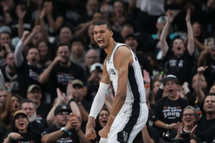 San Antonio Spurs forward/center Victor Wembanyama reacts after a play during the first half in Game 5 of a first-round NBA playoffs basketball series against the Portland Trail Blazers, in San Antonio, Tuesday, April 28, 2026. (AP Photo/Eric Gay)