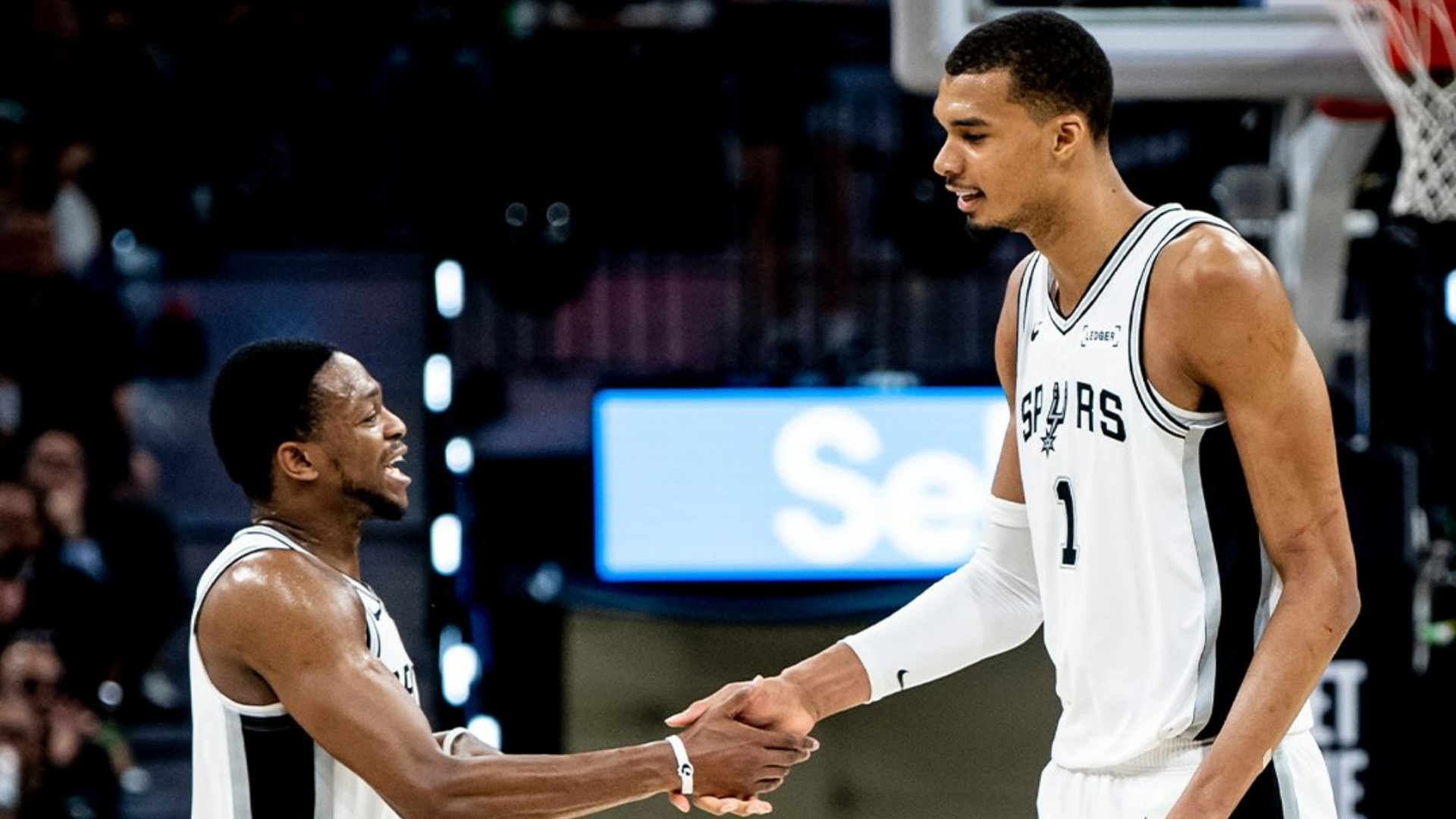 Victor Wembanyama and De'Aaron Fox—sharing a handshake at mid-court following their 114-95 victory over the Portland Trail Blazers on Tuesday night.
