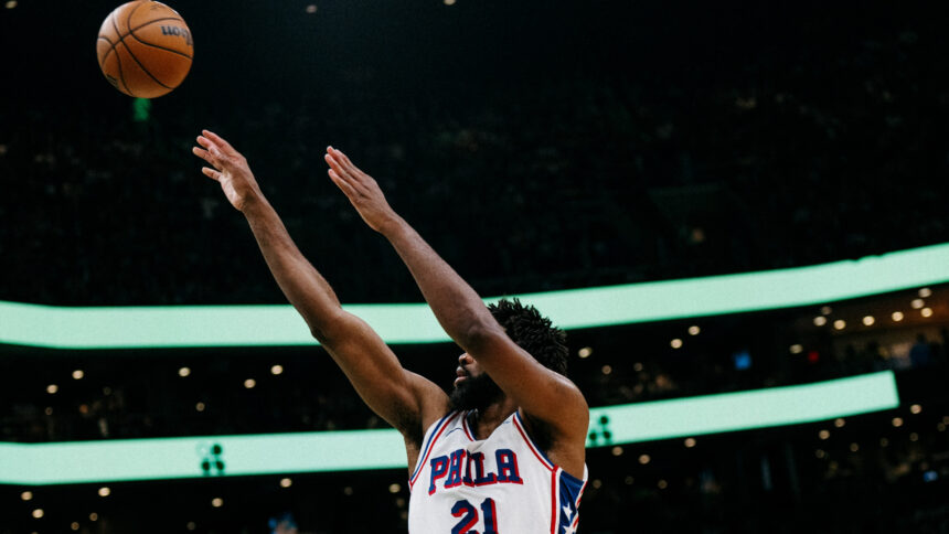 Joel Embiid in action against Celtics