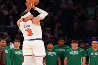 New York Knicks Guard Josh Hart over Boston Celtics Center Nikola Vucevic.