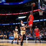 Leonard Miller dunking in Bulls win