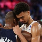 Spurs' Wembanyama being consoled by opponent