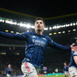 Arsenal's Kai Havertz celebrates after scoring his sides first goal during the Champions League quarterfinals, first leg, soccer match between Sporting CP and Arsenal, in Lisbon, Tuesday, April 7, 2026. (AP Photo/Armando Franca)