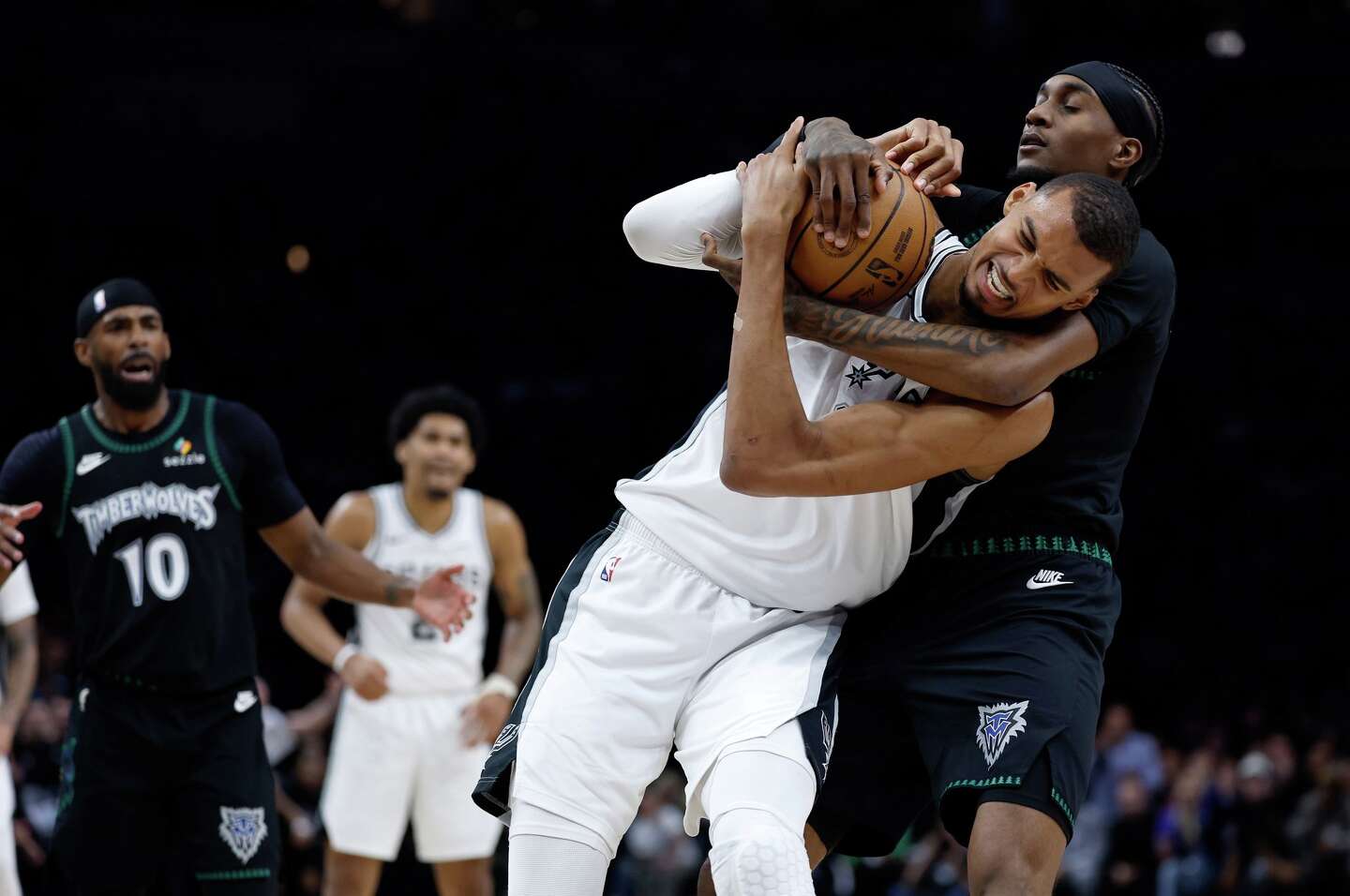San Antonio Spurs forward Victor Wembanyama (1) fights for a rebound before drawing a flagrant fowl charge after throwing an elbow to the face of Minnesota Timberwolves center Naz Reid (11) leading to his ejection in the 2nd quarter of Game 4.Sam Owens/San Antonio Express-News
By Tom Orsborn,
Staff Writer