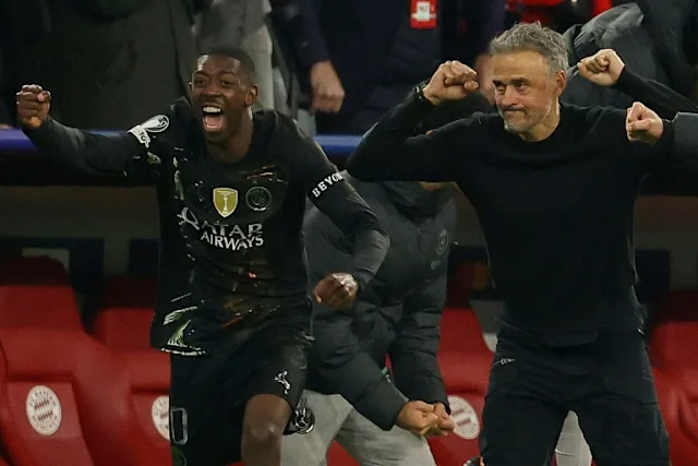 PSG coach Luis Enrique (R) and Ousmane Dembele begin the celebrations after holding off Bayern Munich to reach another Champions League final (Odd ANDERSEN) (Odd ANDERSEN/AFP/AFP)