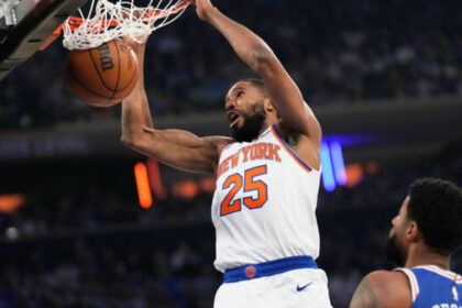 The Knicks’ Mikal Bridges dunks in the first half against Philadelphia during Game 1 of their Eastern Conference second-round game Monday. (AP)