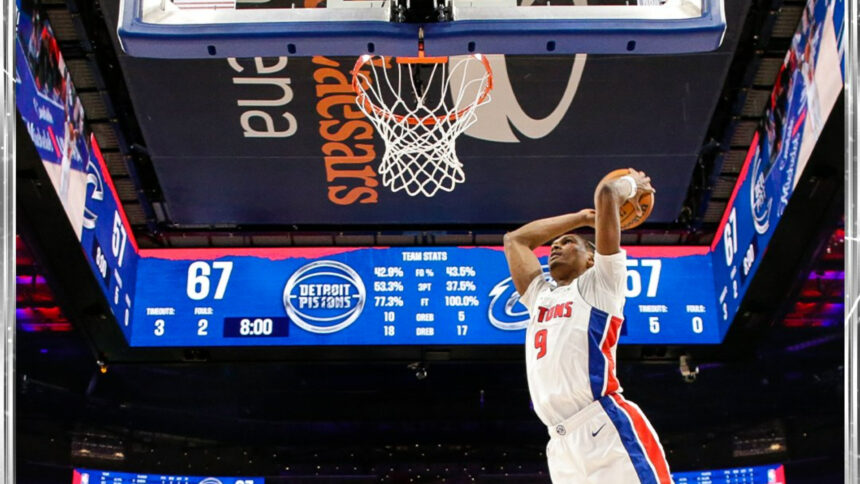Ausar Thompson goes up for a dunk in a game against the Cleveland Cavaliers, with the scoreboard showing the teams tied at 67 during the second half.