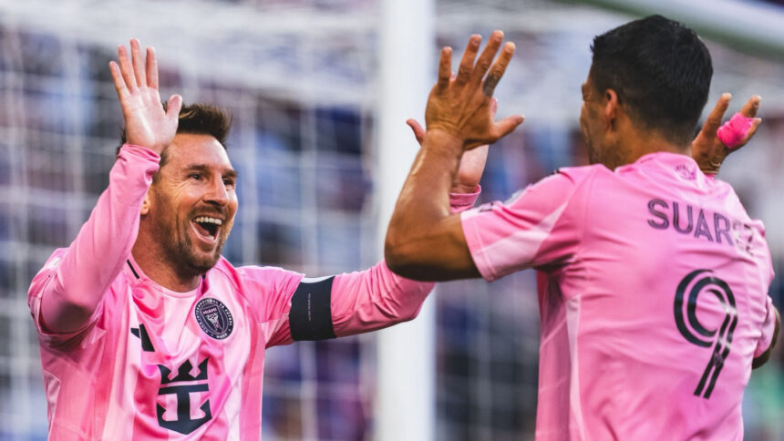 Lionel Messi celebrate with Luis Suarez in 5-3 win over Cincinnati