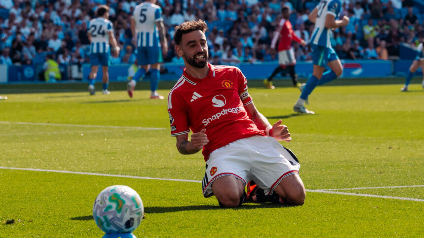 Fernandes slides after scoring United 's third goal to cap off the 2025/26 EPL season