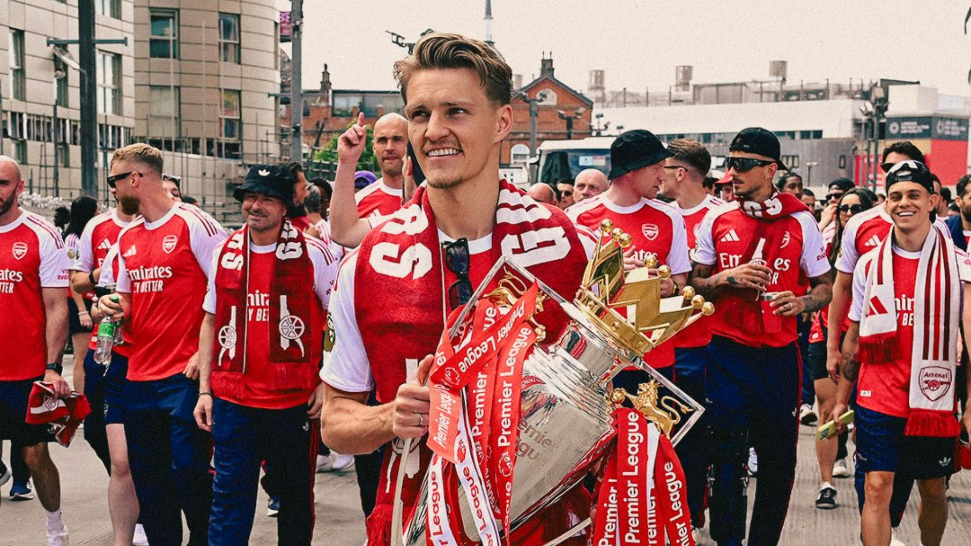 Arsenal parade trophy in North London