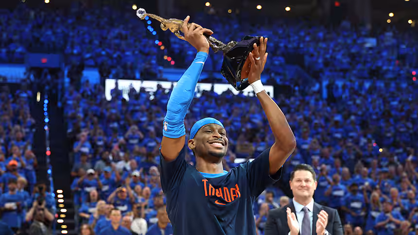 Shai Gilgeous-Alexander lifts the Michael Jordan MVP Trophy in front of a home crowd before an Oklahoma City Thunder game in Oklahoma on May 22. After a stellar season, the 26-year-old from Hamilton, Ontario, was named the NBA’s most valuable player.