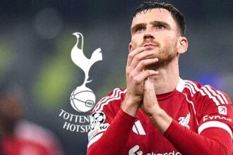 Liverpool defender Andy Robertson with the Tottenham badge