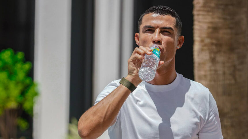 Ronaldo drinking water through reusable bottle
