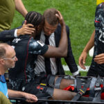 Jesse Marsch embraces Ismael Kone after leg-breaking injury