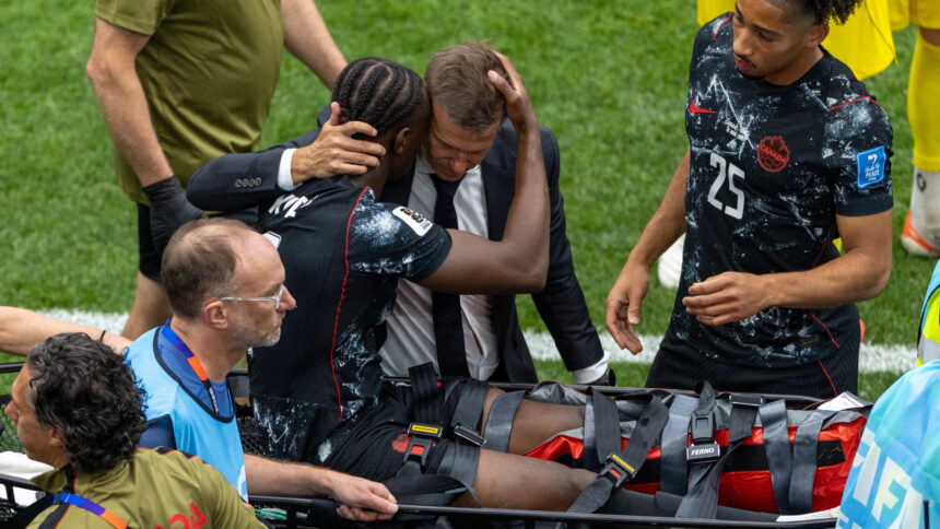 Jesse Marsch embraces Ismael Kone after leg-breaking injury