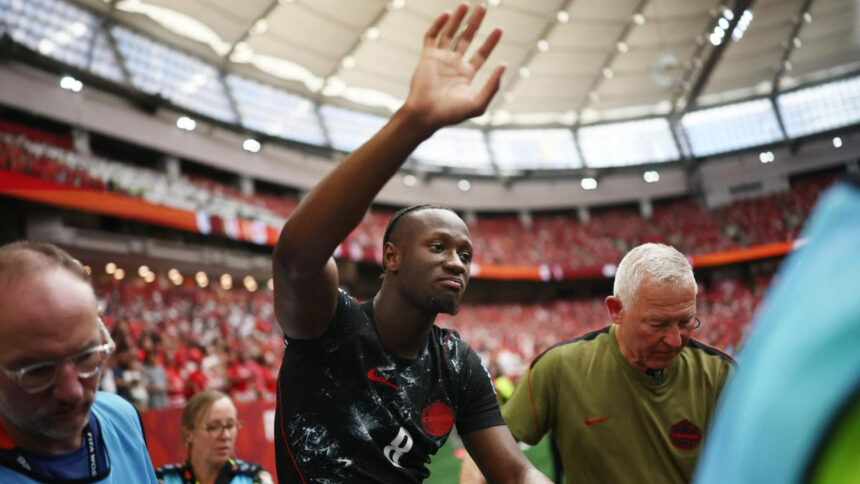 Canada's Ismael Kone waves to the crowd as is stretchered off after sustaining an injury in the FIFA World Cup Group B match against Qatar in Vancouver, on June 18, 2026 | Photo Credit: Reuters