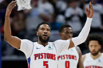 Detroit Pistons guard Malik Beasley (5) celebrates after scoring against the New York Knicks during the first half of Game 6 of an NBA basketball first-round playoff series Thursday, May 1, 2025, in Detroit.
