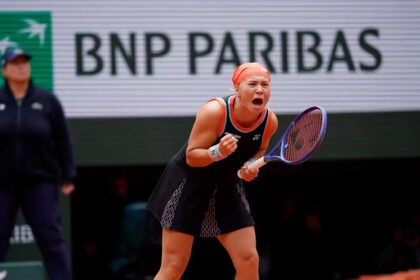 Diana Shnaider celebrates aftwr defeating Aryna Sabalenka