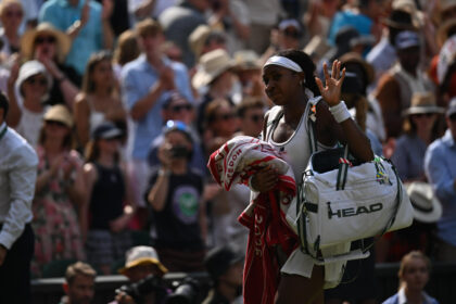 Coco Gauff waves the fans goodbye after losing to Muchova ,