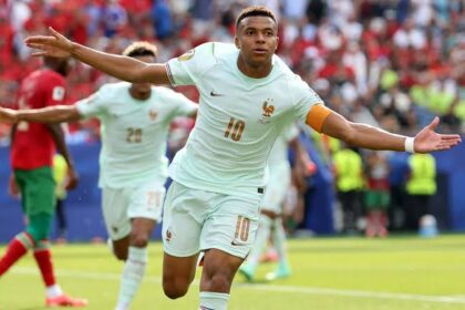 Kylian Mbappe celebrates putting France in front.