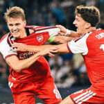 Martin Odegaard celebrates his winning goal against Napoli