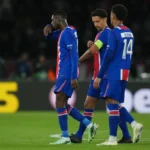 PSG's Ousmane Dembele, left, leaves the field with an injury during the Champions League opening phase soccer match between Paris Saint-Germain and FC Barcelona in Paris, Tuesday, Oct. 20, 2026.