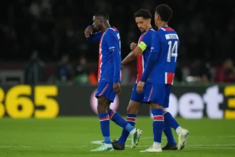 PSG's Ousmane Dembele, left, leaves the field with an injury during the Champions League opening phase soccer match between Paris Saint-Germain and FC Barcelona in Paris, Tuesday, Oct. 20, 2026.