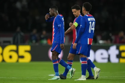 PSG's Ousmane Dembele, left, leaves the field with an injury during the Champions League opening phase soccer match between Paris Saint-Germain and FC Barcelona in Paris, Tuesday, Oct. 20, 2026.