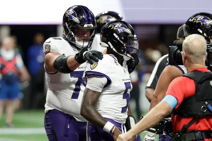 Baltimore Ravens quarterback Tyler Huntley (5) celebrates with teammates after a touchdown run during overtime in a NFL football game against the Atlanta Falcons, Sunday, Oct. 11, 2026,