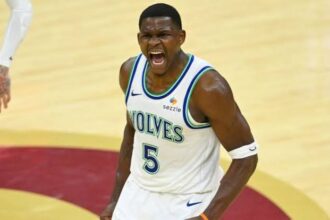 Minnesota Timberwolves guard Anthony Edwards (5) celebrates in the fourth quarter against the Cleveland Cavaliers at Rocket Arena. Credit: David Richard-Imagn Images
